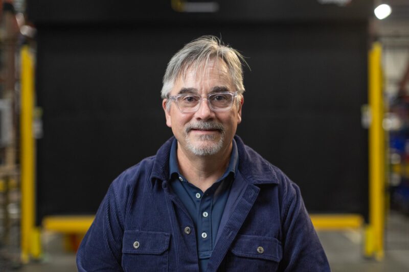 Portrait of Eric Tucker in factory