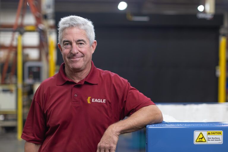 Portrait of Joe McKinley in factory