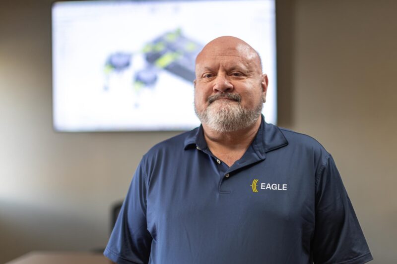 Portrait of Tim Smith in conference room