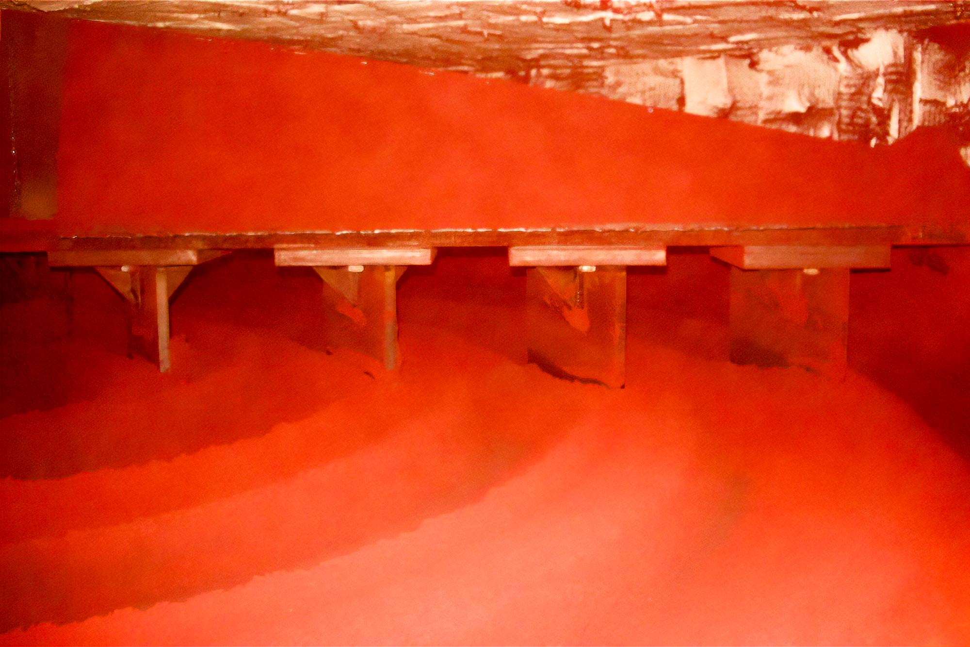 inside view of red lead machine with red lead powder