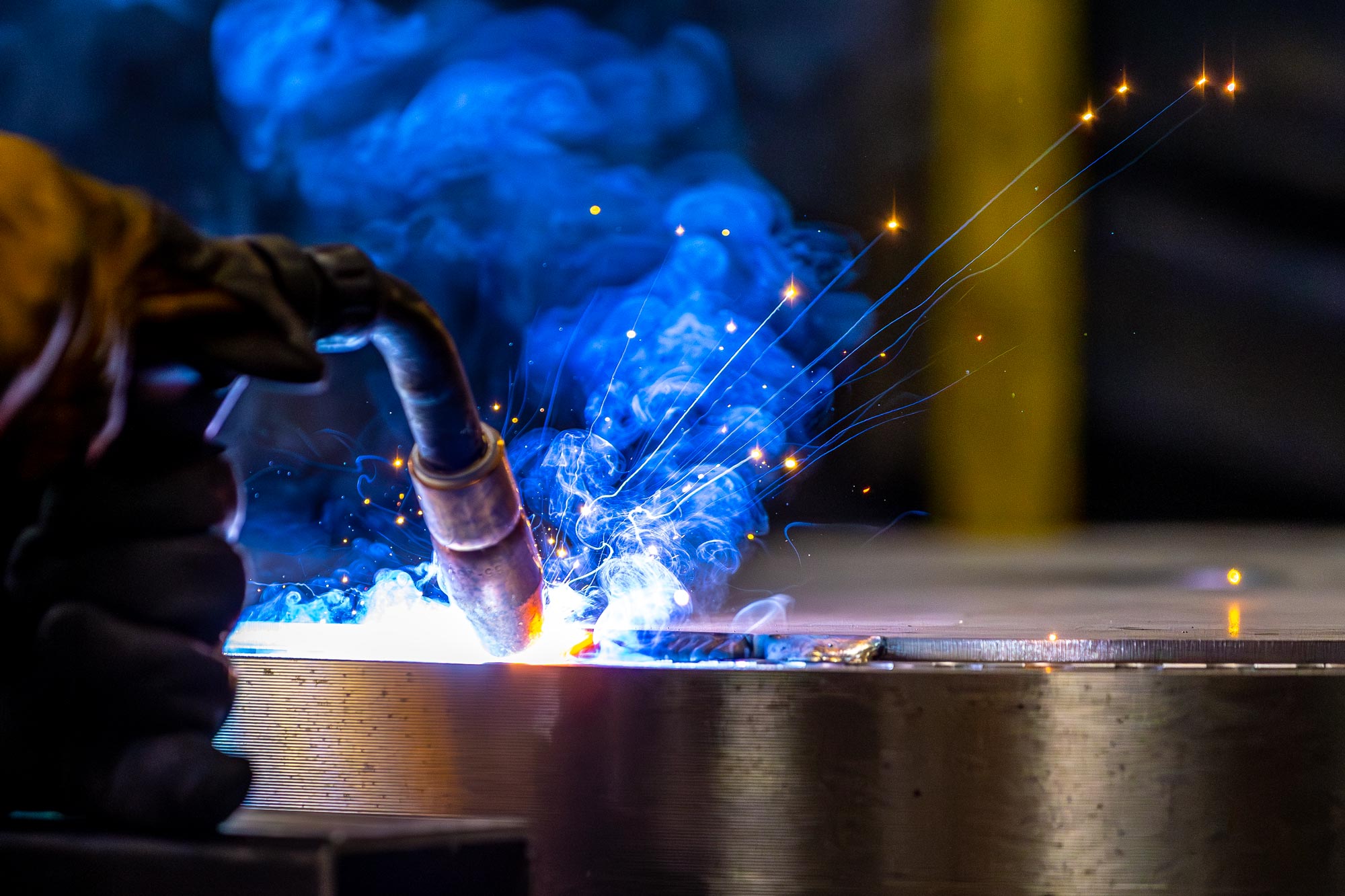 close up of welding with sparks flying