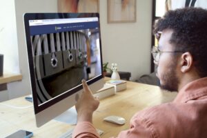 person looking at Eagle website in a business office