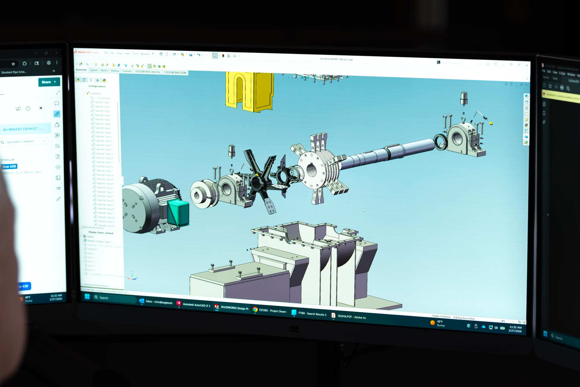 computer screen showing plan renderings of a machine assembly for hammer mill