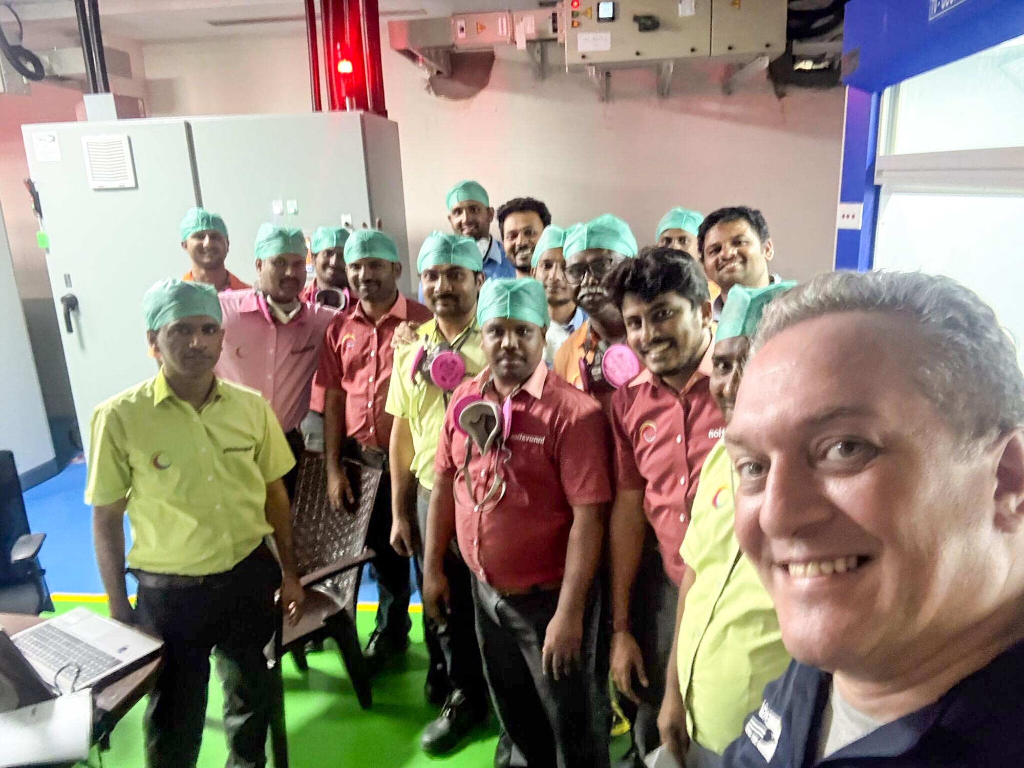 Simone Sandrini with a group of Indian battery manufacturing workers